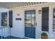 Inviting front porch with decorative mailbox, accent lighting, and decorative gray shutters at 116 Garrison Dr, Belmont, NC 28012
