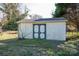 Backyard shed with double doors and room for storage of tools and yard equipment at 116 Garrison Dr, Belmont, NC 28012