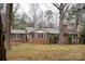 Charming brick home with mature trees and landscaping at 121 Ne 33Rd Ave, Hickory, NC 28601