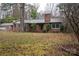 Traditional brick home with a large front yard and mature trees at 121 Ne 33Rd Ave, Hickory, NC 28601