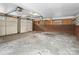 Attached garage featuring an automatic door, brick accent wall and ample space at 121 Ne 33Rd Ave, Hickory, NC 28601