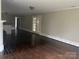 Light filled living room offers hardwood floors, white trim, and glass doors for an inviting atmosphere at 121 Ne 33Rd Ave, Hickory, NC 28601