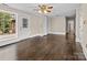 Inviting living room featuring hardwood floors, natural light, and a ceiling fan at 121 Ne 33Rd Ave, Hickory, NC 28601