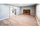 Spacious living room view into the kitchen, with new floors and grey walls at 1229 Jenkins St, Rock Hill, SC 29732