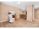 The bonus room includes carpet, a small desk and overlooks the staircase at 128 Lacona Trce, Mooresville, NC 28115