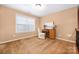 Bonus room with carpet flooring, desk space, and natural light from a window at 128 Lacona Trce, Mooresville, NC 28115