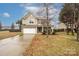 Charming two-story home with a brick and siding exterior, attached garage, and well-manicured lawn in a suburban neighborhood at 128 Lacona Trce, Mooresville, NC 28115