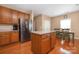 Kitchen featuring a center island, stainless steel appliances, and a dining area at 128 Lacona Trce, Mooresville, NC 28115