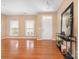 Open and inviting living room featuring hardwood floors, neutral paint, natural light, and ample space for furnishings at 128 Lacona Trce, Mooresville, NC 28115
