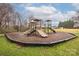 Community playground features slides and climbing structures, providing a fun and safe environment for children at 128 Lacona Trce, Mooresville, NC 28115