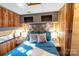 Comfortable bedroom features wood paneling, and grey headboard at 152 Muskhogean Way, Mount Gilead, NC 27306