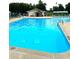 A clear view of the 8-foot deep end of the community swimming pool at 152 Muskhogean Way, Mount Gilead, NC 27306