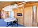 The cozy dining area has a white table with seating, storage, and a fold-down table at 152 Muskhogean Way, Mount Gilead, NC 27306