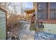 Home exterior with a covered patio, outdoor shower, and landscaped walkway at 152 Muskhogean Way, Mount Gilead, NC 27306