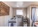 This simple kitchenette has an oven, a coffee maker, and natural light at 152 Muskhogean Way, Mount Gilead, NC 27306