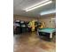 The game room features arcade games and a pool table at 152 Muskhogean Way, Mount Gilead, NC 27306