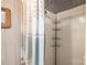 Bright shower features white tiling, and a shower caddy at 152 Muskhogean Way, Mount Gilead, NC 27306