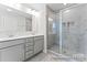 Spacious bathroom with double vanity, tile shower, and modern finishes at 156 Tangle River Dr # 35, Statesville, NC 28677