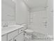 Bright bathroom featuring a shower-tub combo, toilet and vanity with modern fixtures at 156 Tangle River Dr # 35, Statesville, NC 28677