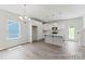 Kitchen featuring an island, pendant lighting, and white cabinets at 156 Tangle River Dr # 35, Statesville, NC 28677