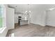 Kitchen featuring an island, pendant lighting, and stainless steel appliances at 156 Tangle River Dr # 35, Statesville, NC 28677