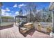 Expansive deck with outdoor kitchen, bar, pergola, and stainless steel grill perfect for outdoor entertaining at 15637 Guthrie Dr, Huntersville, NC 28078