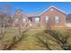 Charming single-story brick home with a well-manicured lawn and inviting front entrance at 1638 Bess Town Rd, Bessemer City, NC 28016