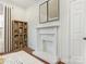Bright living room featuring a fireplace, shelving, and contemporary art at 1921 Union St, Charlotte, NC 28205