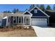 Charming new construction home featuring a two-car garage and inviting covered front porch at 2036 Skyhawk Dr, York, SC 29745