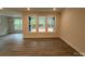 Bright living space with large windows and wood-look floors at 2036 Skyhawk Dr, York, SC 29745