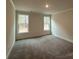 Spacious bedroom featuring plush carpet and great natural light at 2036 Skyhawk Dr, York, SC 29745
