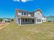 Expansive backyard featuring a covered patio and ample green space at 2211 Camber Dr # Cwo0103, Gastonia, NC 28054