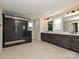 Modern bathroom featuring double vanity, a sleek glass-enclosed shower, and tile flooring at 2211 Camber Dr # Cwo0103, Gastonia, NC 28054