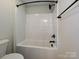 Bright bathroom featuring a tub-shower combo with modern fixtures and a sleek design at 2211 Camber Dr # Cwo0103, Gastonia, NC 28054
