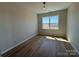 Bright bedroom with natural light from window and luxury vinyl plank flooring at 2211 Camber Dr # Cwo0103, Gastonia, NC 28054