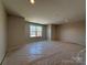 Bonus room featuring a large window, neutral walls, and ample natural light at 2211 Camber Dr # Cwo0103, Gastonia, NC 28054