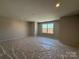 Bonus room featuring a large window, neutral walls, and ample natural light at 2211 Camber Dr # Cwo0103, Gastonia, NC 28054
