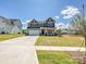 Charming two-story home with a manicured lawn and a spacious two-car garage at 2211 Camber Dr # Cwo0103, Gastonia, NC 28054