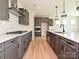 Spacious kitchen with a central island, stainless steel appliances, and ample counter space at 2211 Camber Dr # Cwo0103, Gastonia, NC 28054