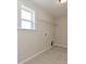 Well-lit laundry room featuring tile flooring, a utility sink hook-up, and a wire shelf at 2211 Camber Dr # Cwo0103, Gastonia, NC 28054