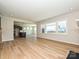A spacious living area with hardwood floors connects to the kitchen through a wide entryway at 2211 Camber Dr # Cwo0103, Gastonia, NC 28054