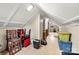 Spacious attic area with unique architectural details, offering potential for storage or renovation projects at 225 Institute St, Mooresville, NC 28115