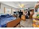 Spacious bedroom featuring a large bed, desk, and ample storage, creating a functional living space at 225 Institute St, Mooresville, NC 28115