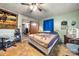 Comfortable bedroom featuring a ceiling fan and convenient access to other rooms at 225 Institute St, Mooresville, NC 28115