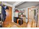 Hallway with storage solutions and a view of a bathroom, providing practical organization and accessibility at 225 Institute St, Mooresville, NC 28115