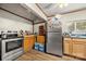 Efficient kitchen with stainless steel appliances, offering plenty of counter space and storage solutions at 225 Institute St, Mooresville, NC 28115