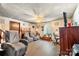Inviting living room with fireplace, fan, and neutral colors at 225 Institute St, Mooresville, NC 28115