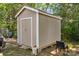 Functional shed featuring a solid door, neutral color, and a clean design for ample outdoor storage at 225 Institute St, Mooresville, NC 28115