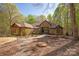 Charming brick home with a well-manicured front yard and inviting stone pathway, surrounded by lush trees at 225 Riverton Rd, Weddington, NC 28104