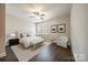Bright and airy bedroom with hardwood floors, neutral tones, and comfortable furniture at 3288 Sherman Dr, Lancaster, SC 29720